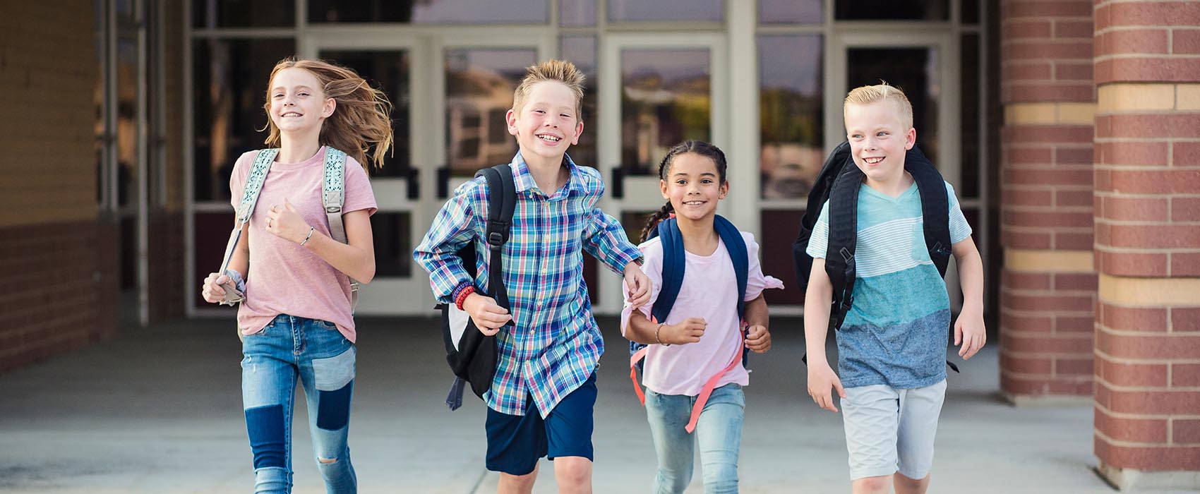 Kids leaving school after a long day.