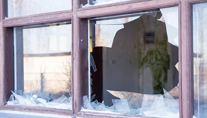 Shattered broken glass. This is avoided with safety window film.